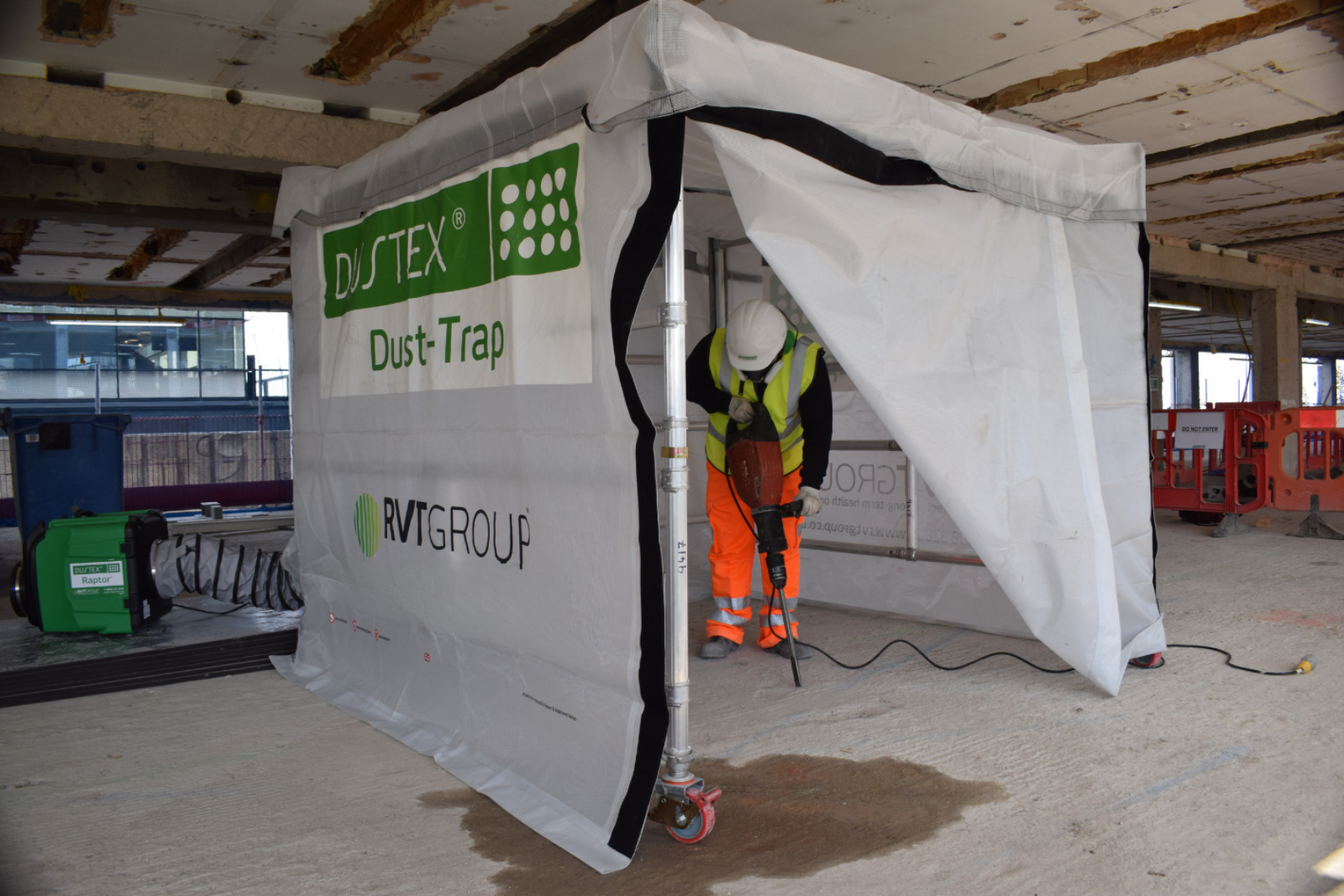 DUSTEX® Dust Trap enclosure with jackhammering worker inside