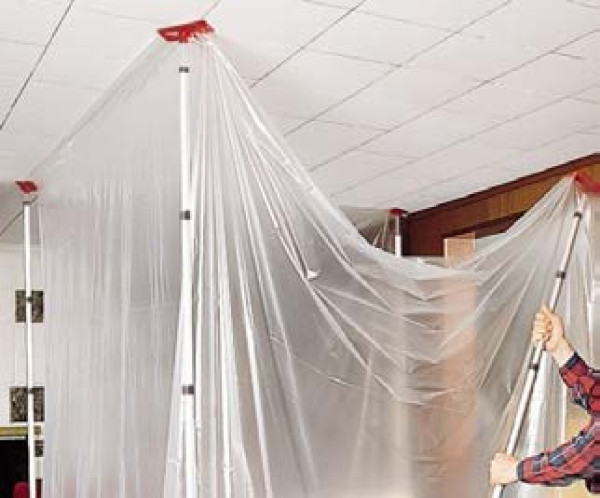 Dustex Quick Props example image with worker using them to put dust sheets in place