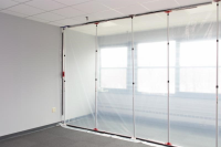 Dustex Quick-Props used to create a temporary dust sheet wall for work taking place inside a building