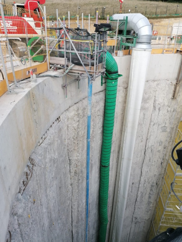 Main image - Ducting in use with a centrifugal fan to provide fresh air to workers inside a shaft