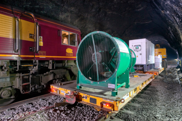 VENTEX Axial Fan 1250S next to an out of use train carriage, providing ventilation through the tunnel as rail works take place