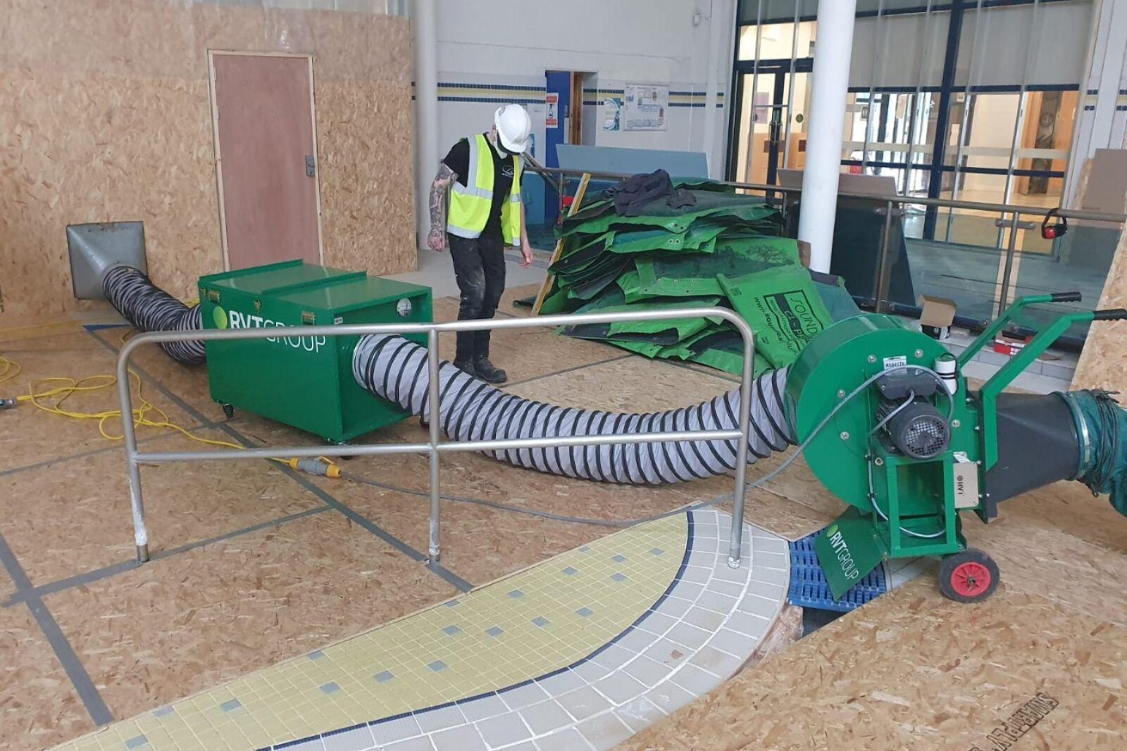 VENTEX Centrifugal Fan 300M making up part of a dust extraction system for tile cutting and replacing at a swimming pool