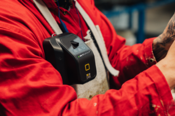 XD ONE Portable Dust Monitor being worn in a workshop